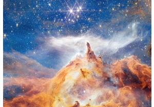 New Webb image shows star formation as glittering, craggy peaks