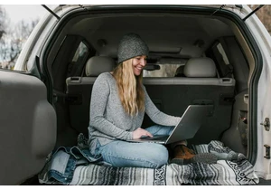 On the road with a dead laptop? Your car can charge it!