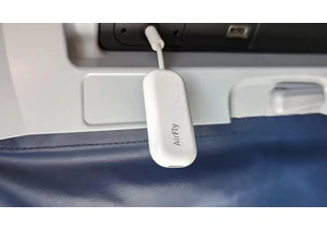 I Never Fly Without This Genius Bluetooth Dongle. Here's Why
