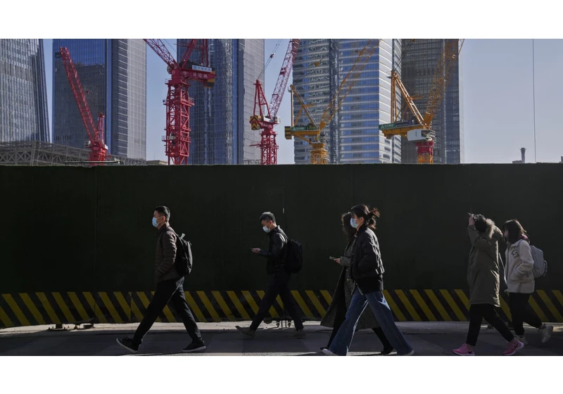 China tries to fend off a financial crisis by shoring up its real estate markets