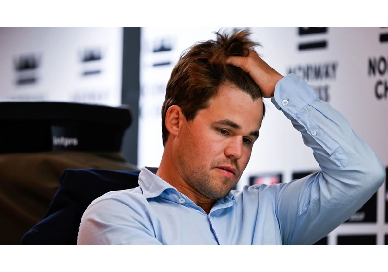 Chess grandmaster Magnus Carlsen rejoins tournament he quit over wearing jeans
