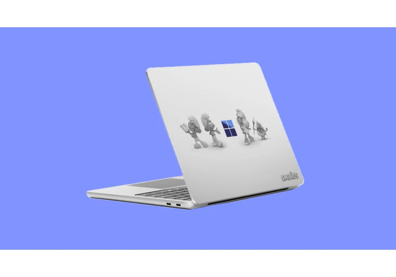  Microsoft launches limited edition 'Smurface Laptop' with blue logo and laser-etched Smurfs on the lid — but there are only 100 for sale! 