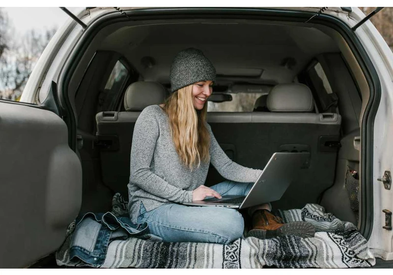 On the road with a dead laptop? Your car can charge it!