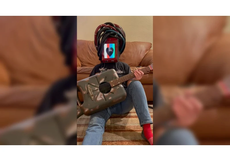 Raspberry Pi Stray Companion Cosplay Plays Music and Makes Faces