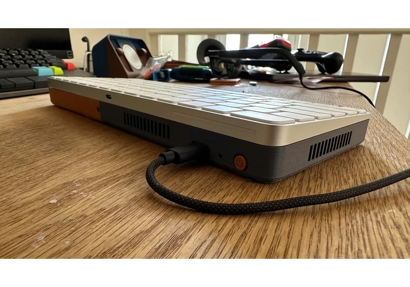  Steam Deck nested inside an Apple Magic Keyboard transforms into a portable gaming PC 