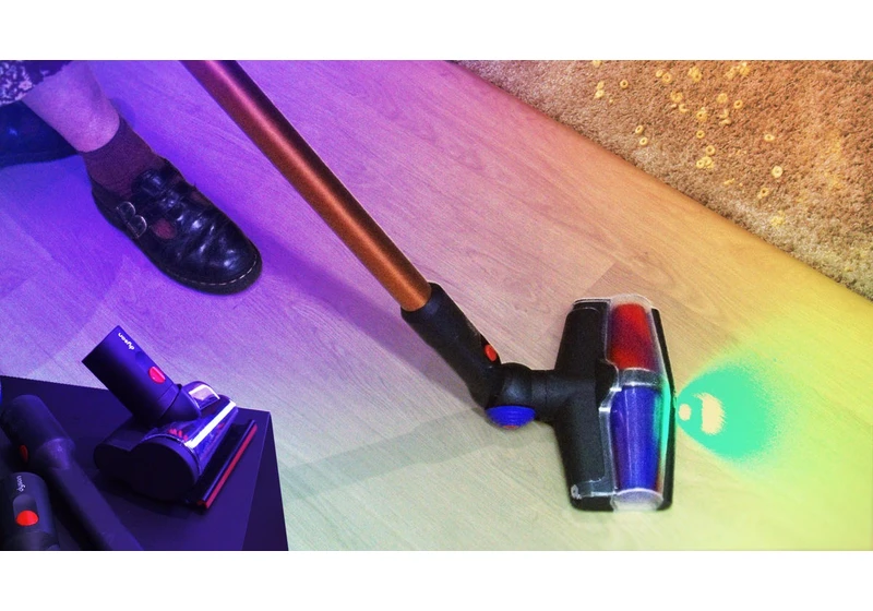 I Tried It: Dyson's Newest Stick Vac Empties So Neatly, I Could Do It in Bed