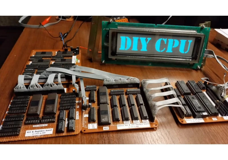 Enthusiast builds a fully functional CPU from old memory chips — hand-solders every wire, writes 1800 lines of assembler code, and makes it play The Matrix on a VFD display